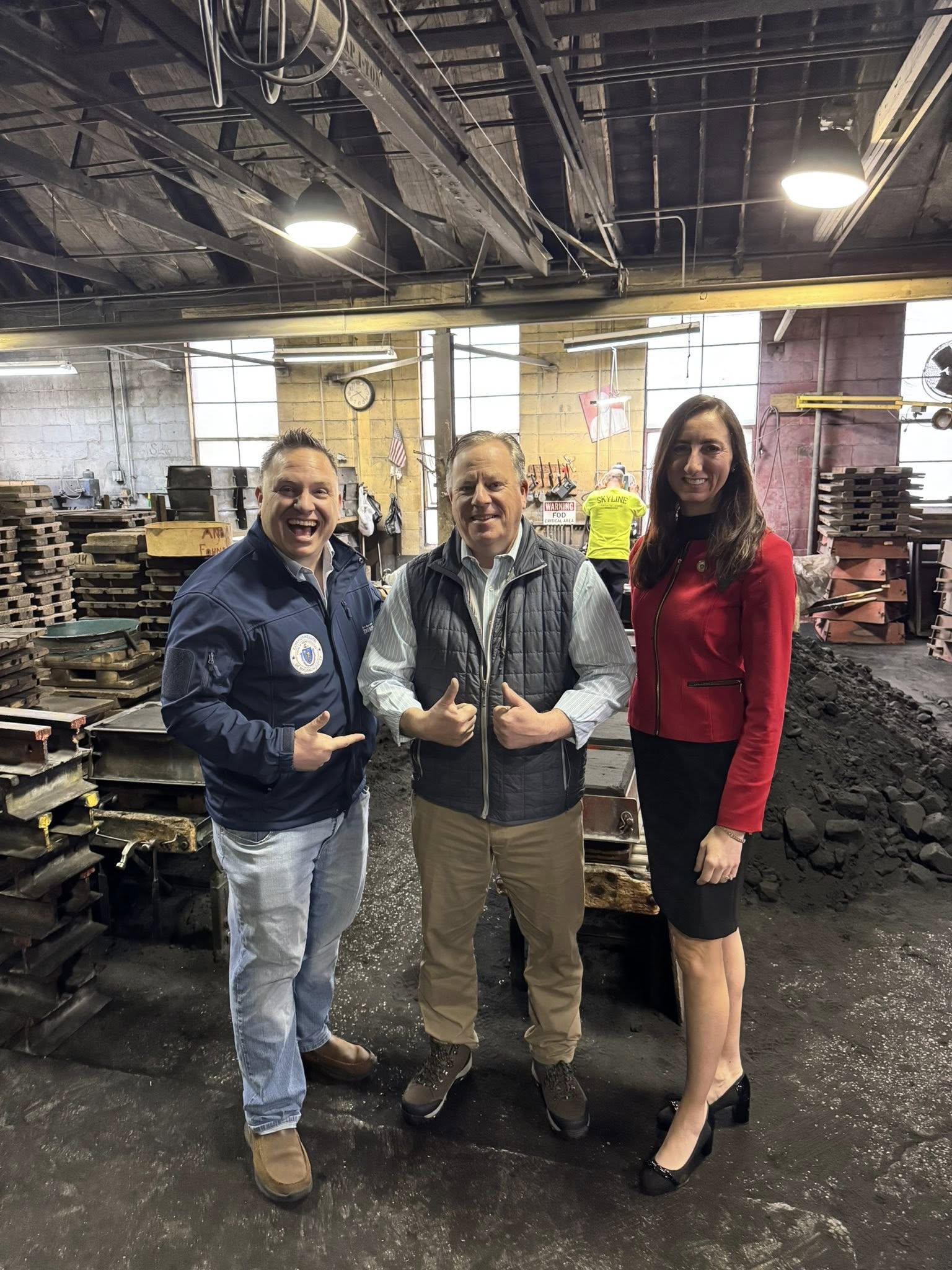 Justin Thurber with the owner and a colleague during a local manufacturing business tour