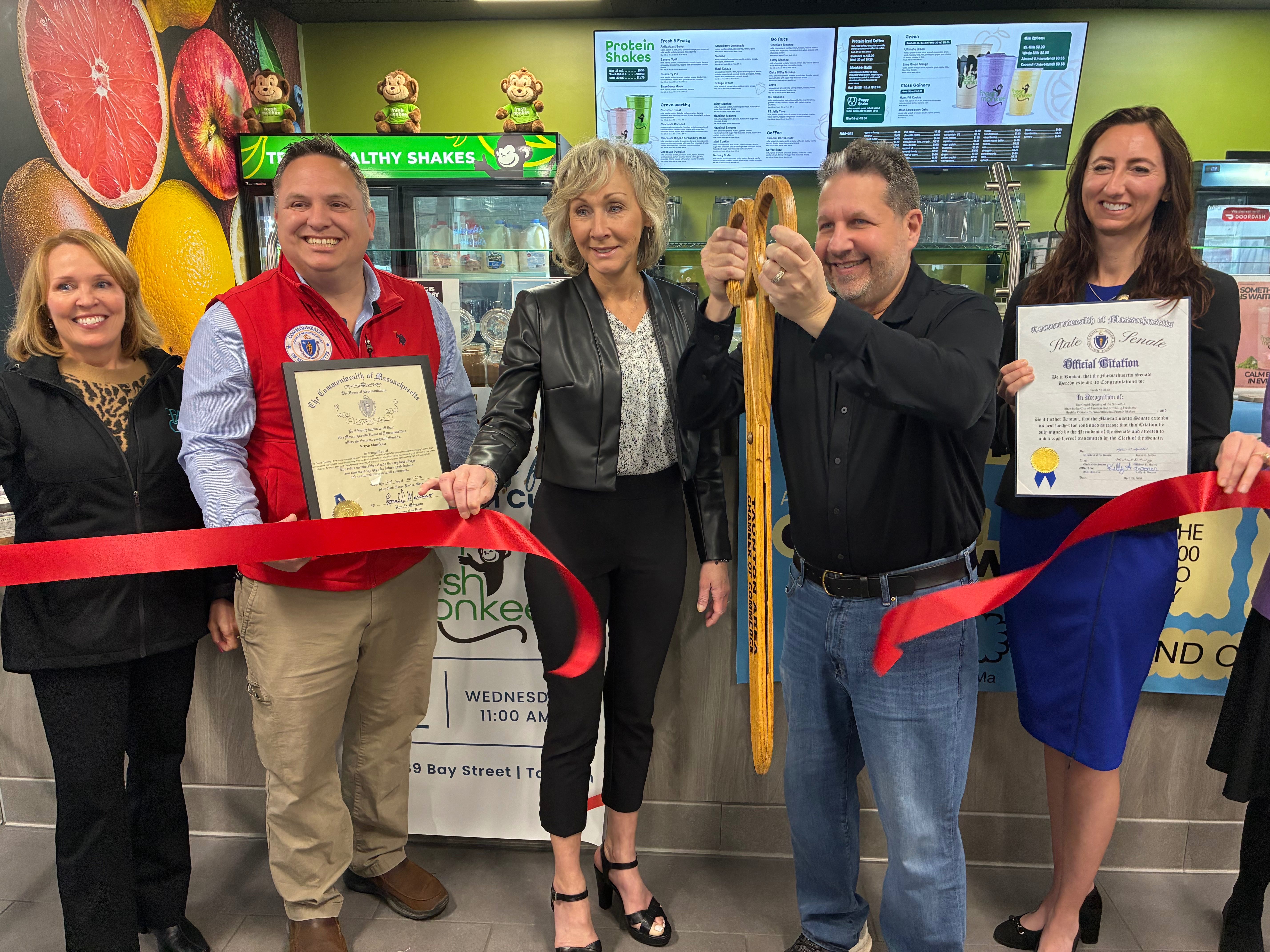 Justin Thurber at a Fresh Monkey ribbon cutting ceremony in Taunton