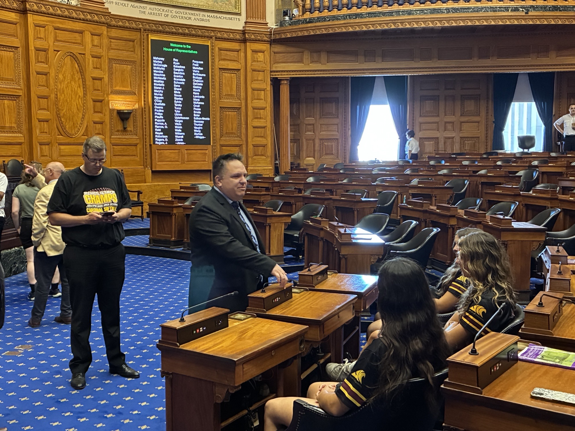 Justin Thurber hosting students in the Massachusetts House of Representatives chamber at the State House